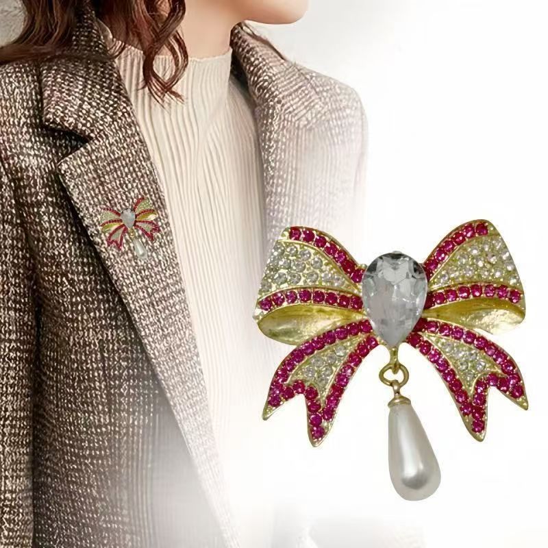 Diamond bow brooch